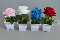 изкуствено цвете в пластмасова кашпа,  роза със зеленина 8х8х20 см. (12 бр. в стек)(144 бр. в кашон)