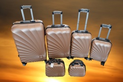 чанти, тип куфари 5 бр. пластмасови 28 in големият (розов и златист)(R3)
